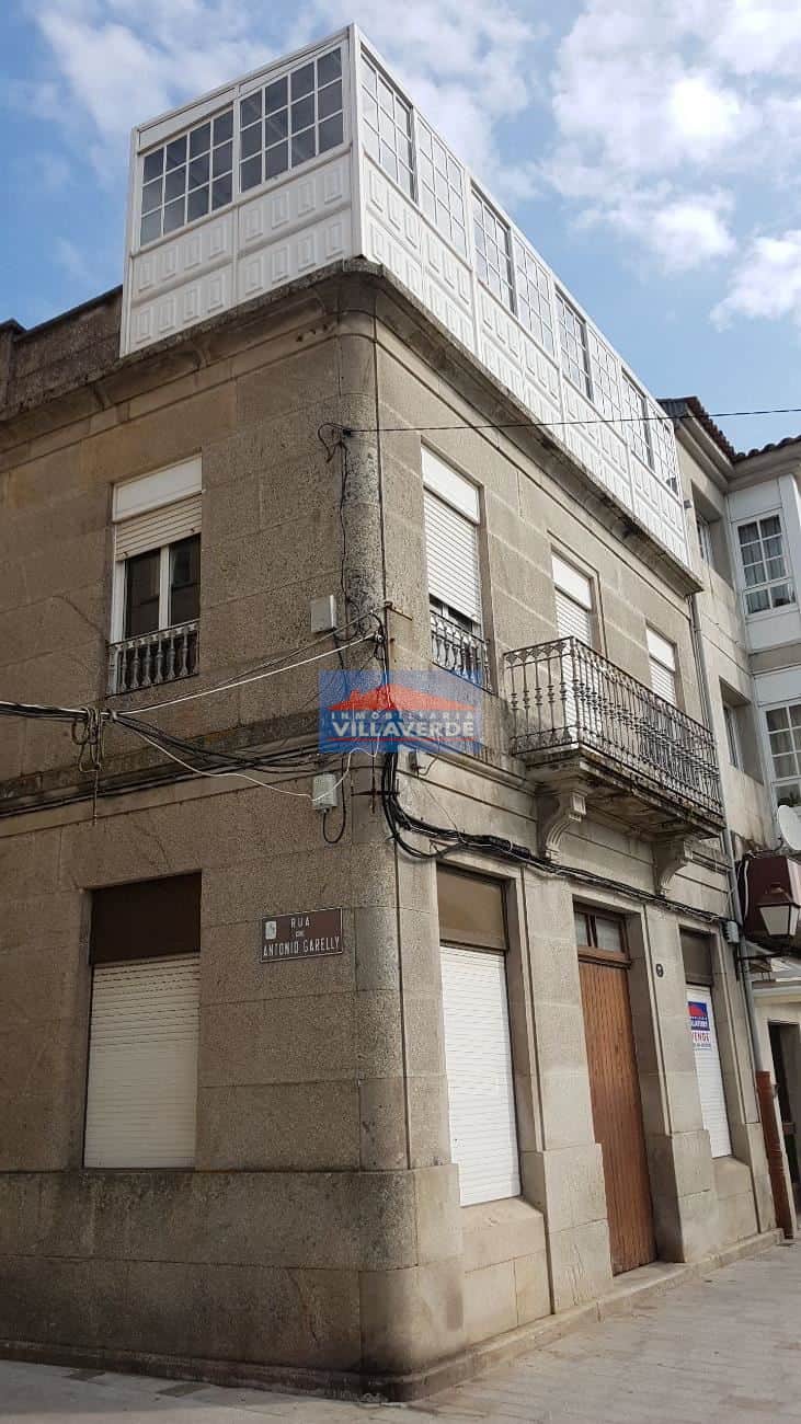 CASA DE PIEDRA EN PRIMERA LÍNEA CON BAJO COMERCIAL - Foto 3