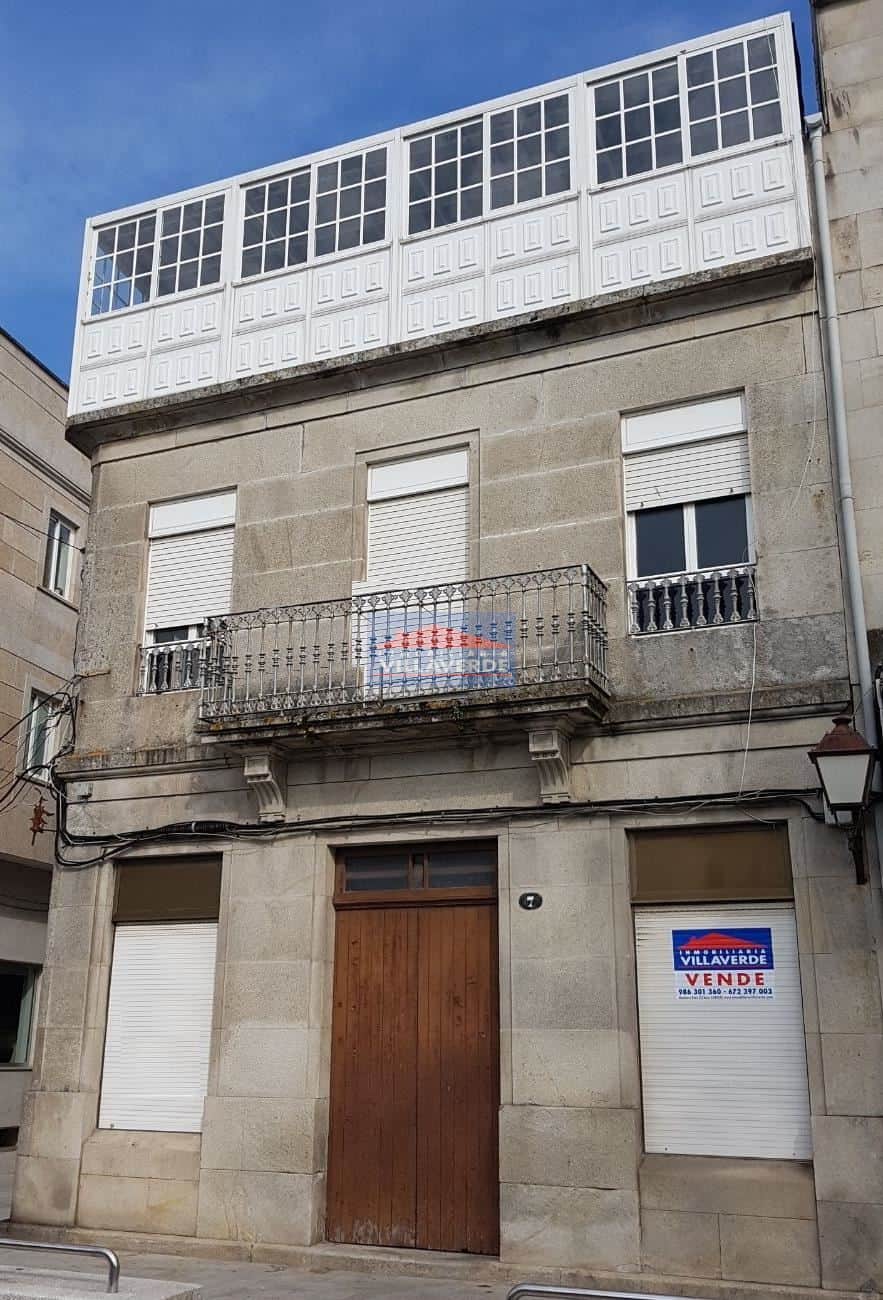 CASA DE PIEDRA EN PRIMERA LÍNEA CON BAJO COMERCIAL - Foto 1